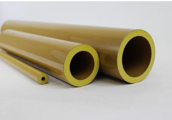 Three Torlon 4203 Seamless Tube stock shapes in different outside and inside diameters