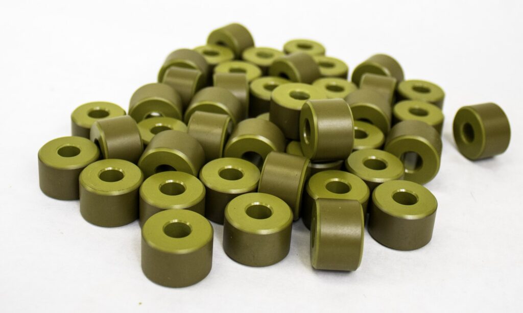 Heavy duty clutch rollers machined from post-cured Torlon tube